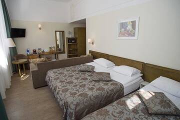 Фото номера Семейный номер (для 2 взрослых и 2 детей) Отель Hotel St. Barbara г. Таллин 3