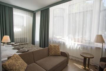 Фото номера Семейный номер (для 2 взрослых и 2 детей) Отель Hotel St. Barbara г. Таллин 4