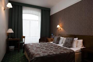 Фото номера Стандартный двухместный номер с 1 кроватью Отель Hotel St. Barbara г. Таллин 2