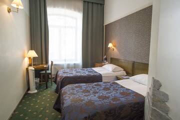 Фото номера Стандартный двухместный номер с 2 отдельными кроватями Отель Hotel St. Barbara г. Таллин 5