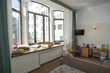 Фото номера Семейный номер (для 2 взрослых и 2 детей) Отель Hotel St. Barbara г. Таллин 2