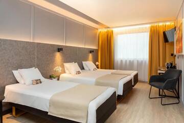 Фото номера Трехместный номер Отель Metropol Hotel г. Таллин 2
