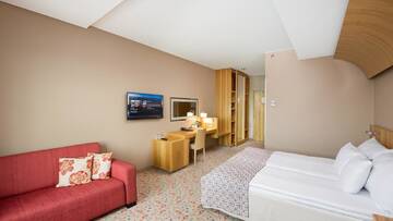 Фото номера Стандартный семейный номер Отель Hestia Hotel Europa г. Таллин 2