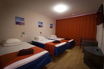 Фото номера Стандартный трехместный номер Отель Peoleo Hotell г. Таллин 3
