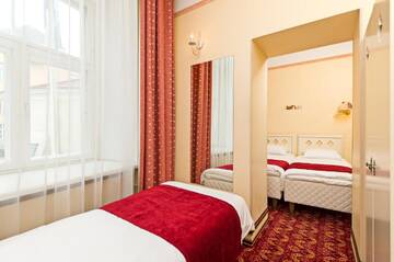 Фото номера Трехместный номер на цокольном этаже Отель Rija Old Town Hotel г. Таллин 2