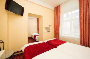 Фото номера Трехместный номер на цокольном этаже Отель Rija Old Town Hotel г. Таллин 4
