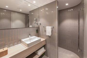 Фото номера Семейный номер (для 2 взрослых и 2 детей) Отель Oru Hub Hotel г. Таллин 4