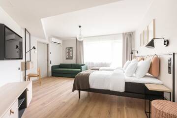 Фото номера Стандартный трехместный номер Отель Oru Hub Hotel г. Таллин 4