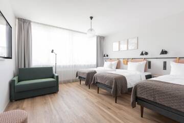 Фото номера Стандартный трехместный номер Отель Oru Hub Hotel г. Таллин 5