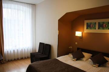 Фото номера Трехместный номер с видом на улицу Отель City Hotel Tallinn by Unique Hotels г. Таллин 4