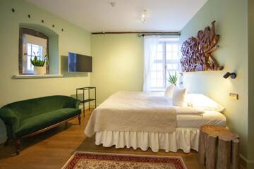 Фото номера Улучшенный двухместный номер с 1 кроватью Отель The Three Sisters Boutique Hotel г. Таллин 7