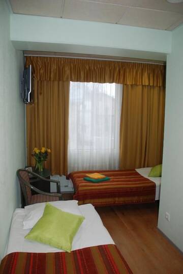 Фото номера Одноместный номер с общей ванной комнатой Отель Center Hotel г. Таллин 5