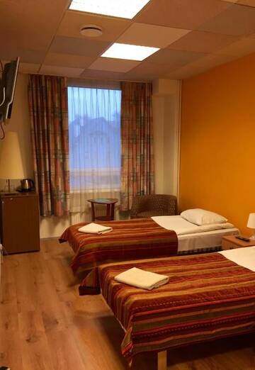 Фото номера Стандартный двухместный номер с 2 отдельными кроватями Отель Center Hotel г. Таллин 30