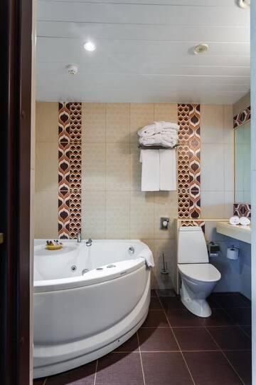 Фото номера Люкс с гидромассажной ванной Отель Hotel Rocca al Mare г. Таллин 6