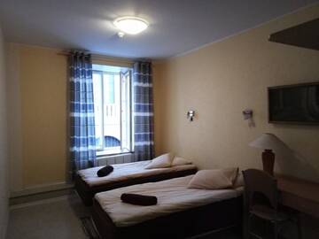 Фото номера Двухместный номер с 2 отдельными кроватями Хостелы Zinc Old Town Hostel Tallinn г. Таллин 11