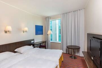 Фото номера Стандартный номер Отель Park Inn by Radisson Meriton Conference &amp; Spa Hotel Tallinn г. Таллин 7