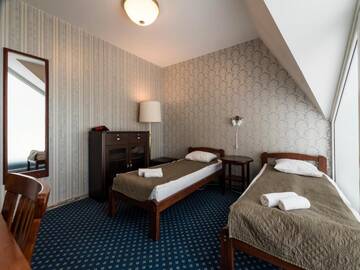 Фото номера Трехместный номер с собственной душевой Отель Humala Guest House г. Таллин 3