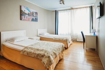 Фото номера Трехместный номер Отель Economy Hotel г. Таллин 5