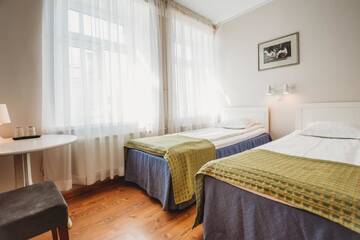 Фото номера Двухместный номер с 2 отдельными кроватями Отель Economy Hotel г. Таллин 11