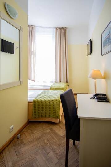 Фото номера Двухместный номер с 2 отдельными кроватями Отель Economy Hotel г. Таллин 13