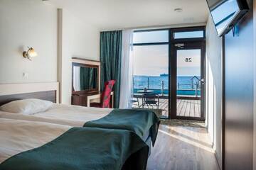 Фото номера Номер-студио с террасой и видом на море Отель Pirita Beach Apartments &amp; SPA г. Таллин 6