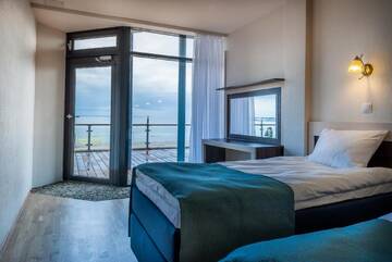 Фото номера Номер-студио с террасой и видом на море Отель Pirita Beach Apartments &amp; SPA г. Таллин 11