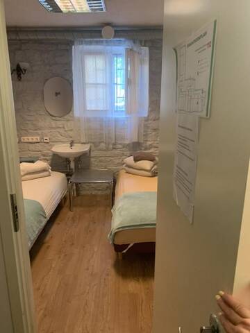 Фото номера Двухместный номер с 2 отдельными кроватями Хостелы Bedroom with Bathroom Private г. Таллин 9