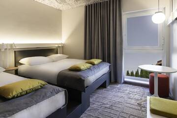 Фото номера Трехместный номер Отель ibis Tallinn Center г. Таллин 3