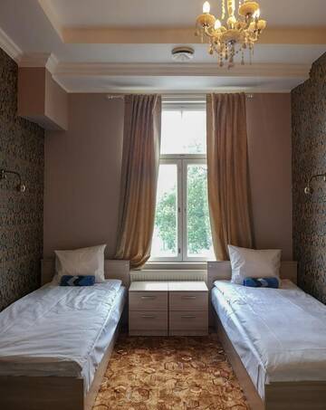 Фото номера Односпальная кровать в общем мужском номере Хостелы Villa Kadriorg Hostel г. Таллин 3