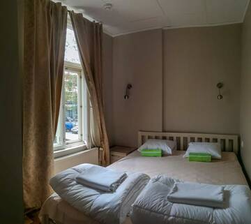 Фото номера Семейный номер с общей ванной комнатой Хостелы Villa Kadriorg Hostel г. Таллин 4