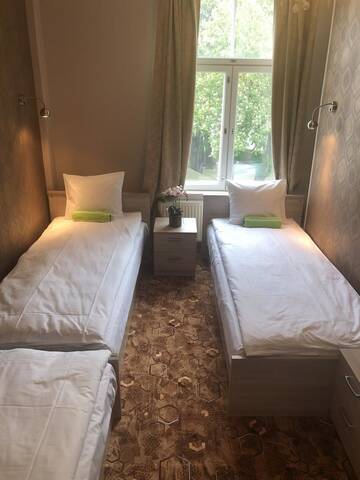 Фото номера Трехместный номер эконом-класса с общей ванной комнатой Хостелы Villa Kadriorg Hostel г. Таллин 2